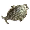 Foto de um(a) Cinzeiro Decorativo Peixe em Bronze, da categoria de Cinzeiros. Lindo cinzeiro vintage em formato de peixe, confeccionado em metal maciço bronze com pátina original do tempo. Vendido no marketplace Trésors.