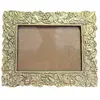 Foto de um(a) Porta Retrato em Bronze - Horizontal, da categoria de Porta retratos. Belíssimo porta-retrato horizontal confeccionado em bronze de alta qualidade. Esta peça apresenta um trabalho de fundição... Vendido no marketplace Trésors.