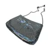 Foto de um(a) Bolsa Vintage Malha Prata, da categoria de Bolsas. bolsa vintage em malha de metal prateado, alça em corrente com comprimento correspondente à transversal. Possui forro e... Vendido no marketplace Trésors.
