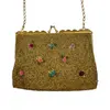 Foto de um(a) Bolsa Vintage Bordada Dourada Mini Rosas, da categoria de Botas. lindíssima bolsa vintage, inteiramente bordada em pedrarias douradas e detalhes de mini rosas bordadas em fio, fecho vovó... Vendido no marketplace Trésors.
