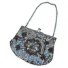 Foto de um(a) Bolsa Vintage Paetê Prata, da categoria de Bolsas. pequena bolsa vintage, bordada em pedrarias e lantejoulas prateadas, possui fecho “vovó”, alça corrente, correspondente à... Vendido no marketplace Trésors.