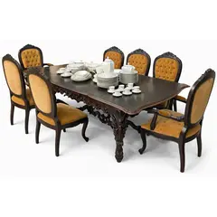 Foto de um(a) Jogo de jantar antigo em Imbuia maciça entalhada – mesa com 6 cadeiras e 2 poltronas, da categoria de Conjunto de mesas e cadeiras. ** LOUÇAS NÃO INCLUSAS ** Magnífico jogo de jantar antigo, confeccionado em imbuia maciça entalhada, madeira nobre... Vendido no marketplace Trésors.