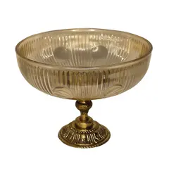 Foto de um(a) Centro de Mesa Exclusivo: Bronze Maciço e Cristal Âmbar Artístico, da categoria de Centro de mesa. Uma peça de presença que redefine a elegância da sua sala de jantar. Este centro de mesa combina a robustez e o brilho... Vendido no marketplace Trésors.