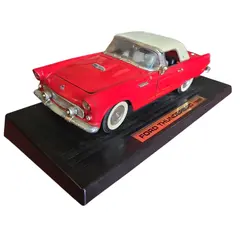 Foto de um(a) Miniatura Ford Thunderbird 1955 - Escala 1:18 - Vermelho/Branco (Relíquia), da categoria de Carros e caminhões de brinquedo. Apresentamos uma peça icônica do automobilismo americano: a miniatura do Ford Thunderbird 1955. Este exemplar capta toda a... Vendido no marketplace Trésors.