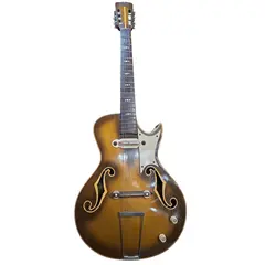 Foto de um(a) Raridade: Guitarra Del Vecchio Archtop 1957 Timbre Vox – Goldburst – 100% Original com Case, da categoria de Instrumentos musicais. Um Testemunho Histórico da Música Brasileira Essa guitarra é uma joia rara, uma das primeiras guitarras elétricas fabricadas... Vendido no marketplace Trésors.