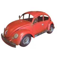 Foto de um(a) Fusca de Lata - Vermelho - Grande (Relíquia), da categoria de Carros e caminhões de brinquedo. Destaque sua coleção ou decoração com esta autêntica peça um Fusca de Lata fabricado artesanalmente. Este item capta a... Vendido no marketplace Trésors.