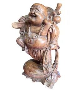 Foto de um(a) Escultura Buda em Madeira Maciça Esculpida à Mão, da categoria de Escultura. Linda peça decorativa entalhada em um único bloco de madeira maciça. Apresenta veios naturais e acabamento primoroso que... Vendido no marketplace Trésors.