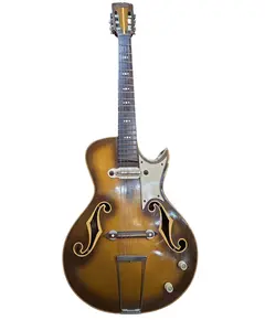 Foto de um(a) Raridade: Guitarra Del Vecchio Archtop 1957 Timbre Vox – Goldburst – 100% Original com Case, da categoria de Instrumentos musicais. Um Testemunho Histórico da Música Brasileira Essa guitarra é uma joia rara, uma das primeiras guitarras elétricas fabricadas... Vendido no marketplace Trésors.