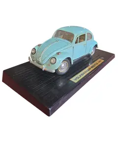 Foto de um(a) Miniatura Volkswagen Beetle (Fusca) 1967 - Azul - Escala 1:18 (Relíquia), da categoria de Carros e caminhões de brinquedo. Esta é uma peça indispensável para qualquer colecionador de clássicos: a miniatura do Volkswagen Beetle 1967. O modelo de... Vendido no marketplace Trésors.