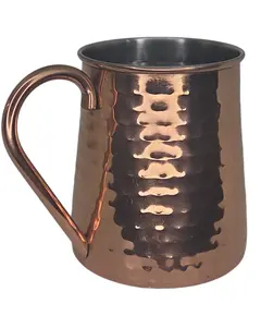 Foto de um(a) Caneca Moscow Mule Threshold - Aço Inox com Acabamento Cobre Martelado, da categoria de Canecas. Desfrute de seus drinks com estilo e a temperatura ideal. Esta caneca da marca Threshold é o acessório indispensável para... Vendido no marketplace Trésors.