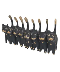 Foto de um(a) Jogo de Porta-Guardanapos "Gatos Pretos" - 08 Peças em Madeira Pintada, da categoria de Anel para guardanapo. Adicione um toque de personalidade e descontração à sua mesa com este exclusivo conjunto de porta-guardanapos em formato de... Vendido no marketplace Trésors.