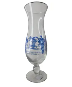 Foto de um(a) Antigo Copo Hurricane Souvenir Louis Pappas Restaurant Flórida, da categoria de Outros colecionáveis. Como é um item de glassware temático americano (misturando a cultura náutica, mergulho de escafandro e turismo da Flórida),... Vendido no marketplace Trésors.