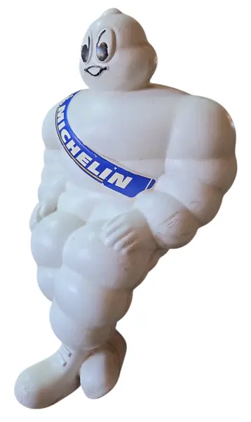 Foto de um(a) Boneco Michelin, da categoria de Bonecos de arte. Rara figura publicitária do icônico mascote da marca de pneus Michelin, o Bibendum. Este boneco apresenta o design clássico... Vendido no marketplace Trésors.