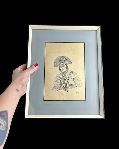 Foto de um(a) Quadro Vintage Lampião Nanquim, da categoria de Molduras para quadros. quadro VINTAGE nanquim sob papel, representando figura de Lampião, assinado Rubens e datado de 1962, com paspatour em tom de... Mostrado de uma perspectiva diferente. Vendido no marketplace Trésors.