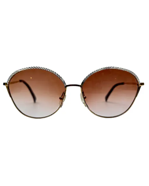 Foto de um(a) Armação Vintage Dior, da categoria de Óculos. Armação VINTAGE Christian Dior, as lentes atuais possui em grau, em metal cinzelado em ouro e prata , seu modelo... Mostrado de uma perspectiva diferente. Vendido no marketplace Trésors.