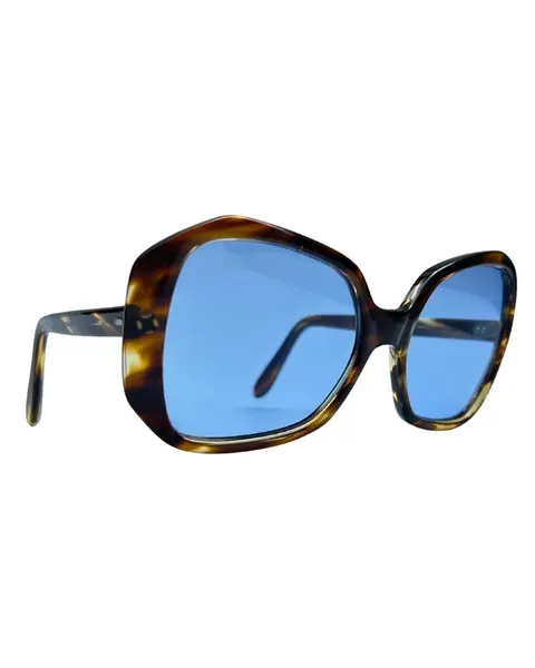 Foto de um(a) Óculos Vintage Novo Montclair Havana, da categoria de Óculos. Óculos VINTAGE Montclair, armação em acetato na cor padrão havana, semi transparência, lentes claras/média azulada. Seu... Mostrado de uma perspectiva diferente. Vendido no marketplace Trésors.
