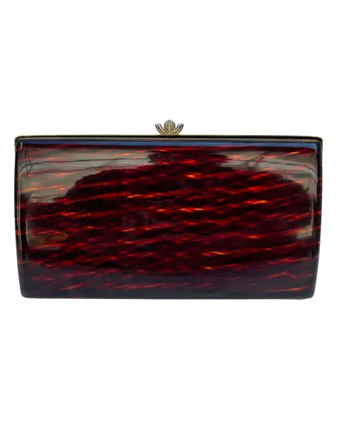 Foto de um(a) Clutch de Mão CGC Lucite Tartarura, da categoria de Bolsas. clutch vintage CGC, em lucite padrão tartaruga, ferragem em metal, fecho estilo vovó, não possui alça, compatível ao tamanho... Vendido no marketplace Trésors.