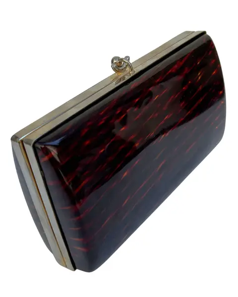 Foto de um(a) Clutch de Mão CGC Lucite Tartarura, da categoria de Bolsas. clutch vintage CGC, em lucite padrão tartaruga, ferragem em metal, fecho estilo vovó, não possui alça, compatível ao tamanho... Mostrado de uma perspectiva diferente. Vendido no marketplace Trésors.