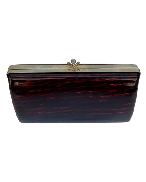 Foto de um(a) Clutch de Mão CGC Lucite Tartarura, da categoria de Bolsas. clutch vintage CGC, em lucite padrão tartaruga, ferragem em metal, fecho estilo vovó, não possui alça, compatível ao tamanho... Mostrado de uma perspectiva diferente. Vendido no marketplace Trésors.