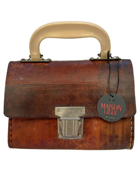 Foto de um(a) Mini Bag Couro Rusty, da categoria de Bolsas. Pequena bolsa de mão em couro vintage. Provavelmente com antiga finalidade de pequena ferramenta, atualmente pode ser usada... Mostrado de uma perspectiva diferente. Vendido no marketplace Trésors.