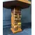 Foto de um(a) Mesa de Xadrez Entalhada, da categoria de Mesas de centro. Antiga mesa de xadrez, base em escultura de totem asteca entalhado em monobloco de carvalho, tampo oitavado com inscrições... Mostrado de uma perspectiva diferente. Vendido no marketplace Trésors.