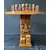 Foto de um(a) Mesa de Xadrez Entalhada, da categoria de Mesas de centro. Antiga mesa de xadrez, base em escultura de totem asteca entalhado em monobloco de carvalho, tampo oitavado com inscrições... Mostrado de uma perspectiva diferente. Vendido no marketplace Trésors.