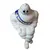 Foto de um(a) Boneco Michelin, da categoria de Bonecos de arte. Rara figura publicitária do icônico mascote da marca de pneus Michelin, o Bibendum. Este boneco apresenta o design clássico... Mostrado de uma perspectiva diferente. Vendido no marketplace Trésors.
