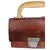 Foto de um(a) Mini Bag Couro Rusty, da categoria de Bolsas. Pequena bolsa de mão em couro vintage. Provavelmente com antiga finalidade de pequena ferramenta, atualmente pode ser usada... Mostrado de uma perspectiva diferente. Vendido no marketplace Trésors.